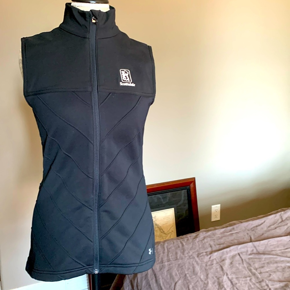 Scotsdale Underarmor golf vest. Black and fits long. 2 side zippers.